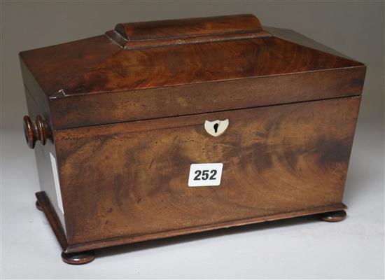 A rosewood tea caddy